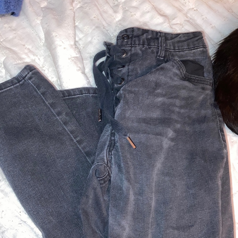 11/30 light wash tied black skinny jeans